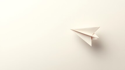 Paper airplane soaring on a pristine light background capturing aspirations
