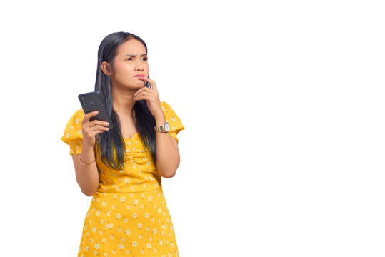 Portrait of pensive young Asian woman using a mobile phone and looking away isolated on transparent background