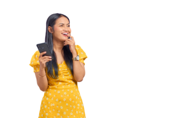 Portrait of smiling young Asian woman using a mobile phone and looking away isolated on transparent background