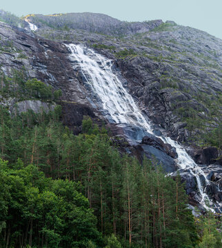 Landfoss Waterfall 2000 ft tall cascade flowing into Akrafjorden