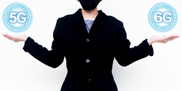 5G and 6G concept image with person in black suit holding network icons. Represents technology evolution, device internet speed, future telecom, and wireless communication