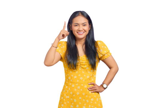 Smiling young Asian woman pointing fingers up and having an idea isolated on transparent background