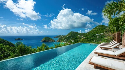 Obraz premium A luxury hotel pool with sun loungers and a stunning ocean view