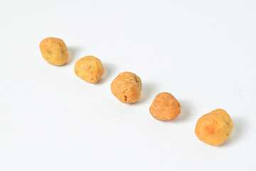 Photo of five egg nuts isolated on white background. Clipping path. Close up. 