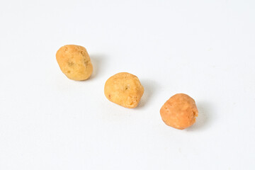 Photo of three egg nuts isolated on white background. Clipping path. Close up. 