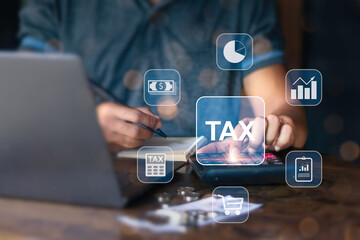 Entrepreneur is calculating income and using laptop to fill online income tax form for payment. Financial research, government taxes and tax refund calculation concept.