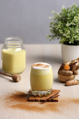 two glass of turmeric latte