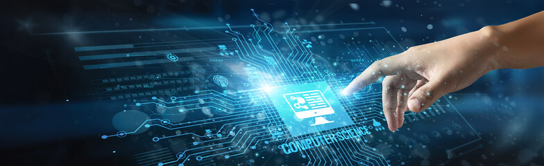 A businessman touches an icon and the word 'Computer Science,' symbolizing innovation in coding, technology, algorithms, data, programming, systems development, and digital transformation.