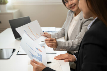 Financial consult planning investor asses and present to client, Close up shot client and advisor review investment strategy in the office.