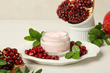 Self care and skincare products concept - pomegranate cosmetics