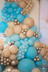 Balloons garland for little baby party on a blue background.