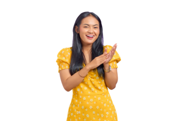Smiling young Asian woman doing applause gesture isolated on transparent background