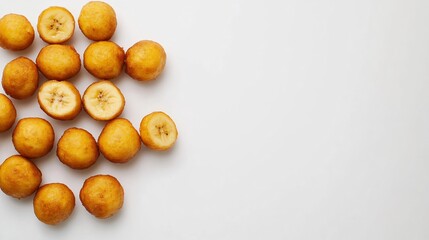 Flat lay of mikate banana fritters plain white background sweet Congolese street snack golden deep fried dough balls simple dessert Congo enjoyed across Africa cut out isolated transparent background