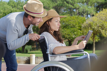 man in wheelchair and girlfriend on holidays