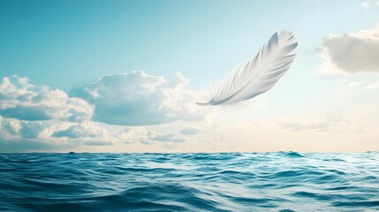 White feather floats over tranquil ocean
