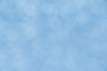 winter season backdrop: close up of light blue bokeh texture
