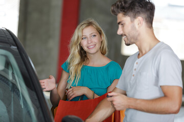 a couple in car park