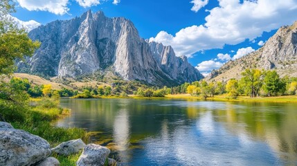 River flowing steadily through deep canyon below sharp mountain ridge