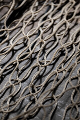 Fishing net on rustic old wood, fishing concept, art craft themes
