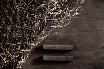 Fishing net on rustic old wood, fishing concept, art craft themes
