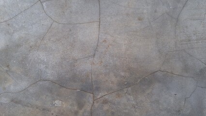 Old grunge concrete surface with weathered cement texture and rough stone patterns, ideal for...