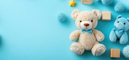 Soft teddy bear and blue stuffed toy on a vibrant turquoise background with wooden blocks and decorative elements scattered around