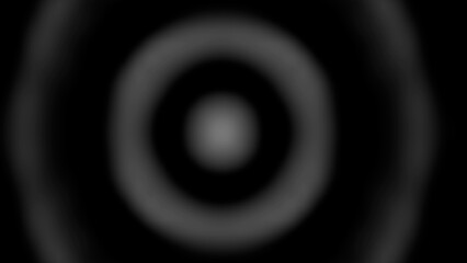 Abstract concentric circles of light and shadow create a dynamic visual effect.