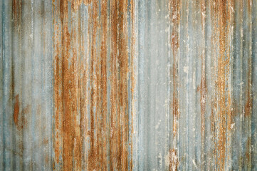 Old zinc wall texture background, rusty on galvanized metal panel sheeting.