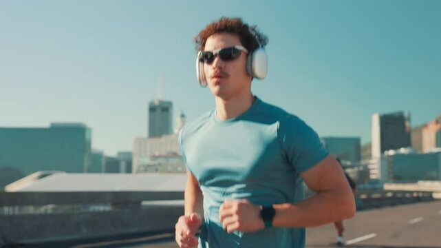 Headphones, athlete and check time with running in city for workout pace, performance monitor and track progress. Man, smart watch and sunglasses for marathon speed, fitness podcast or exercise music