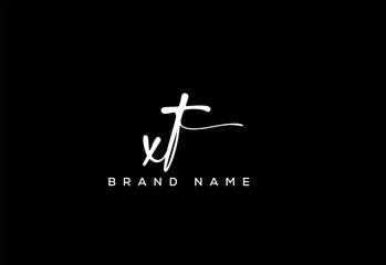 XT letter beauty handwriting vector logo.