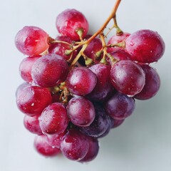 Fototapeta premium Vibrant Grape Cluster: A close-up of a vivid grape cluster, showcasing the rich hues of fresh, ripe fruit. Each juicy grape glistens with freshness, promising a burst of natural sweetness.