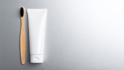 A vibrant toothbrush with soft bristles and a colorful tube of toothpaste are neatly mounted on a bathroom wall, ready for daily dental care.