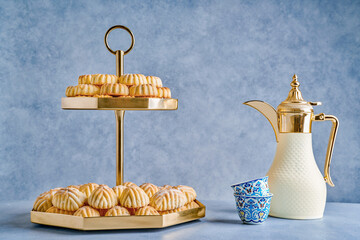 Assorted semolina maamoul or mamoul cookies with dallah . Traditional arabic Eid al Adha, Eid al...