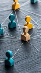 Obraz premium Conceptual Network of People Figurines Representing Teamwork and Communication network teamwork team