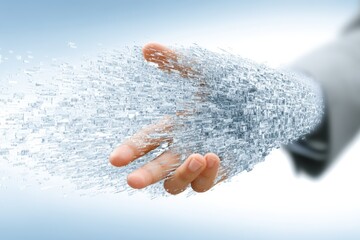 Fototapeta premium Futuristic hand dispersing particles in a digital manner.