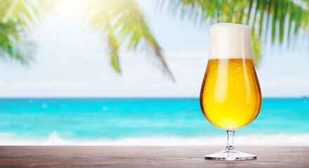 A glass of beer with a golden hue and frothy head