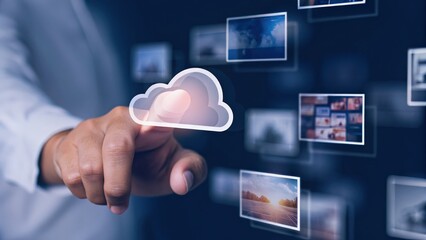A hand interacting with cloud technology and digital images.