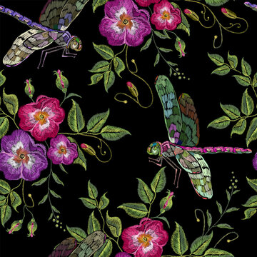 Dragonflies and wild roses flowers. Embroidery seamless pattern. Vintage spring and summer template for design of clothes and t-shirt design. Garden art
