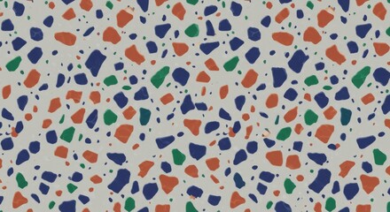 Abstract pattern of multicolored mosaic shapes on a light gray background.