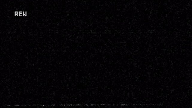 Rewind  REW Analog TV Old VHS Display on black background. 4K Video