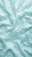 Obraz premium Crinkled Light Blue Fabric Texture with Soft Folds.
