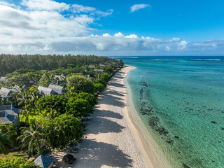 Aerial photo of coastal villas, turquoise reef, and scenic Mauritius shoreline
