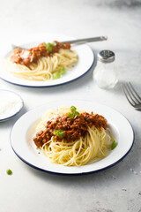 Traditional Spaghetti Bolognese with grated cheese