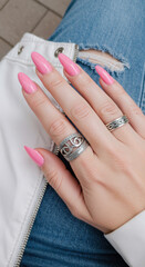Pink Perfection: Almond Nails & Silver Rings - Trendy Manicure & Jewelry Style | Fashionista Look