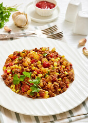 ground beef stew of potatoes and chopped tomatoes