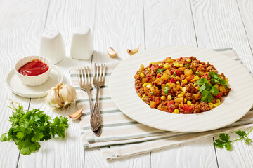ground beef stew of potatoes and chopped tomatoes