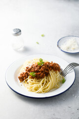 Traditional Spaghetti Bolognese with grated cheese