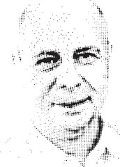 A grayscale portrait of a smiling man with closed eyes.