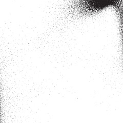 Fototapeta premium A textured white background with scattered black dots creates a dynamic abstract surface.