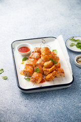 Salmon skewers with sweet chili sauce